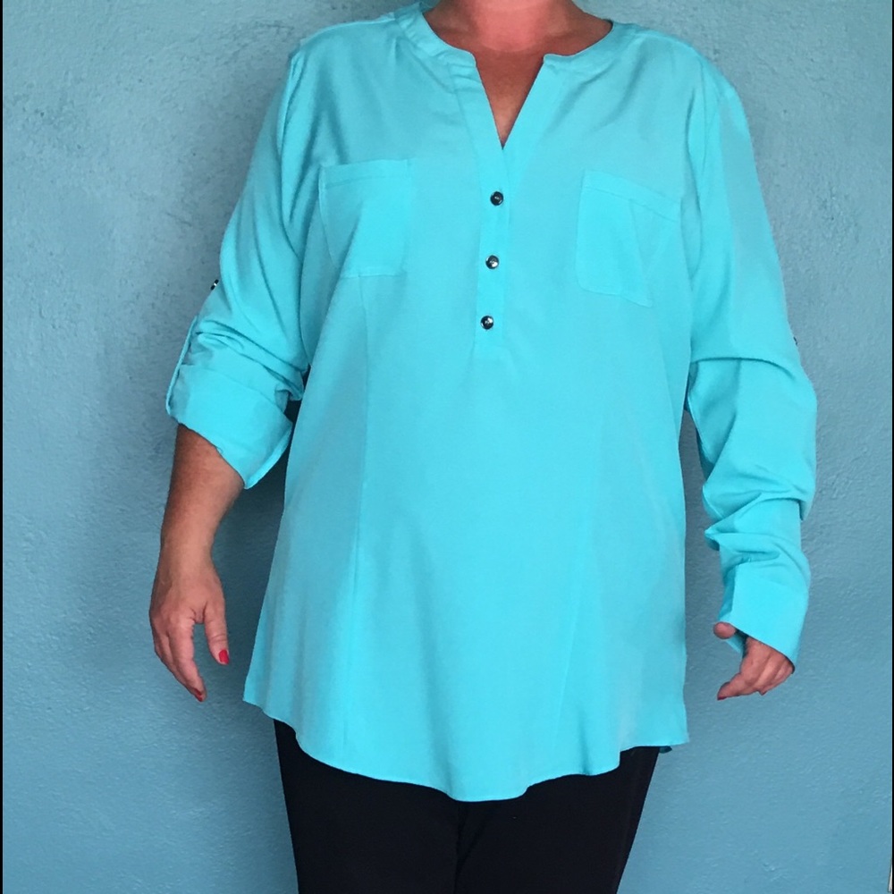 Brand new top!  Looks great with dress pants.